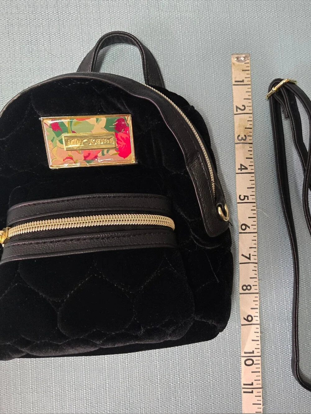 Betsey Johnson Black Quilted Velvet Mini Backpack with Floral Plaque